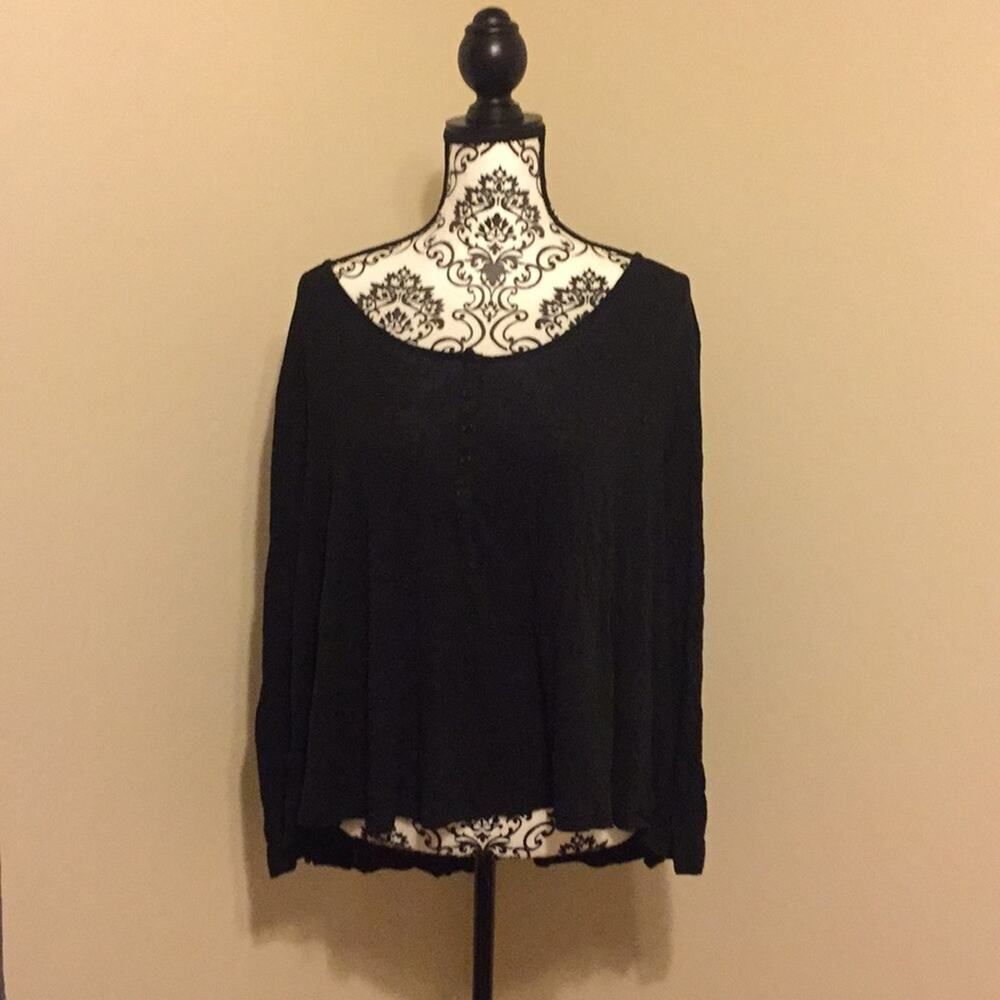 Top shorter in the front longer in the back.